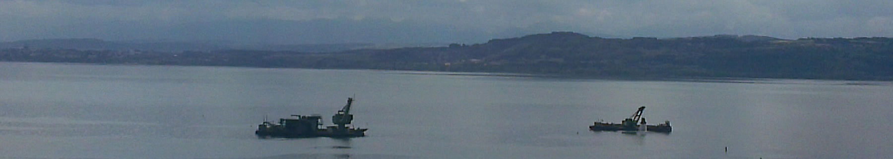 Banner showing working boats on the river Rhone