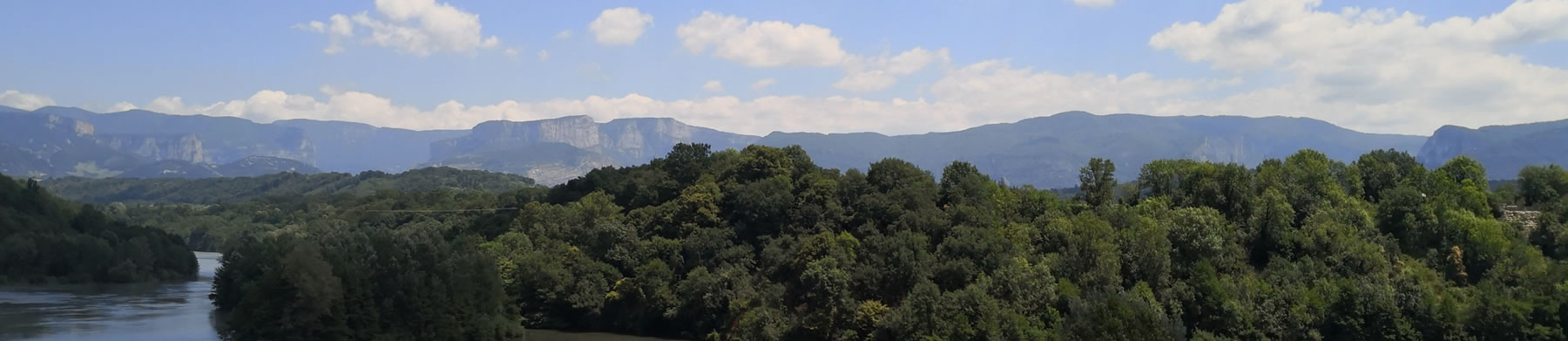 Banner showing view of river flowing through gorge