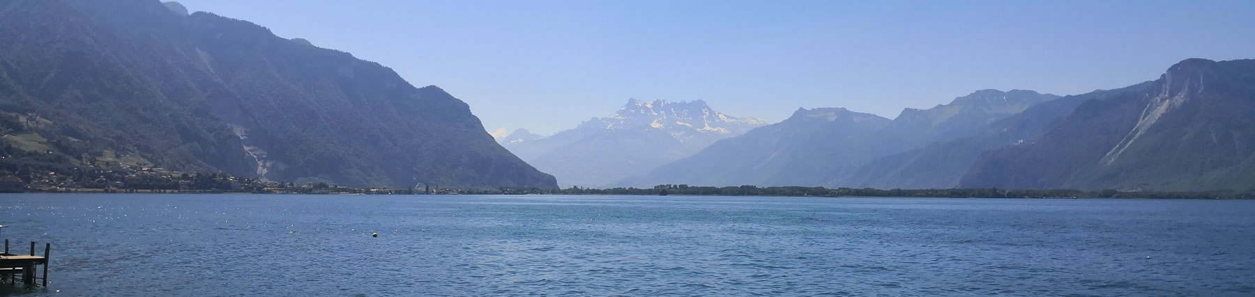 Banner showing lake Geneva with mountains in background