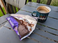 Coffee and refrigerated hence solid chocolate!